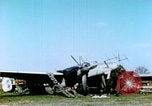 Image of Camouflaged wrecked German Heinkel He-111 airplanes Germany, 1945, second 3 stock footage video 65675020427