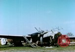 Image of Camouflaged wrecked German Heinkel He-111 airplanes Germany, 1945, second 4 stock footage video 65675020427