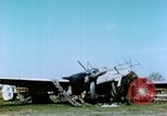 Image of Camouflaged wrecked German Heinkel He-111 airplanes Germany, 1945, second 5 stock footage video 65675020427