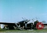 Image of Camouflaged wrecked German Heinkel He-111 airplanes Germany, 1945, second 7 stock footage video 65675020427