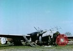 Image of Camouflaged wrecked German Heinkel He-111 airplanes Germany, 1945, second 8 stock footage video 65675020427