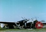 Image of Camouflaged wrecked German Heinkel He-111 airplanes Germany, 1945, second 9 stock footage video 65675020427