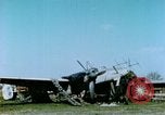 Image of Camouflaged wrecked German Heinkel He-111 airplanes Germany, 1945, second 12 stock footage video 65675020427
