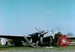 Image of Camouflaged wrecked German Heinkel He-111 airplanes Germany, 1945, second 13 stock footage video 65675020427