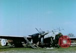 Image of Camouflaged wrecked German Heinkel He-111 airplanes Germany, 1945, second 17 stock footage video 65675020427