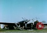 Image of Camouflaged wrecked German Heinkel He-111 airplanes Germany, 1945, second 18 stock footage video 65675020427