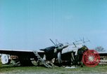 Image of Camouflaged wrecked German Heinkel He-111 airplanes Germany, 1945, second 19 stock footage video 65675020427