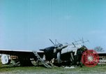 Image of Camouflaged wrecked German Heinkel He-111 airplanes Germany, 1945, second 21 stock footage video 65675020427