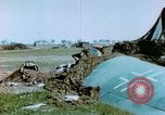 Image of Camouflaged wrecked German Heinkel He-111 airplanes Germany, 1945, second 22 stock footage video 65675020427