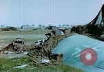 Image of Camouflaged wrecked German Heinkel He-111 airplanes Germany, 1945, second 30 stock footage video 65675020427
