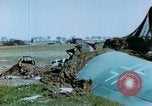 Image of Camouflaged wrecked German Heinkel He-111 airplanes Germany, 1945, second 33 stock footage video 65675020427
