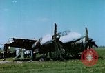 Image of Camouflaged wrecked German Heinkel He-111 airplanes Germany, 1945, second 44 stock footage video 65675020427