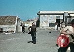 Image of Allied French soldiers man guns Tunis Tunisia Tunis Port, 1943, second 5 stock footage video 65675020446