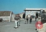 Image of Allied French soldiers man guns Tunis Tunisia Tunis Port, 1943, second 16 stock footage video 65675020446