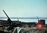 Image of Allied French soldiers man guns Tunis Tunisia Tunis Port, 1943, second 35 stock footage video 65675020446