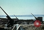 Image of Allied French soldiers man guns Tunis Tunisia Tunis Port, 1943, second 45 stock footage video 65675020446