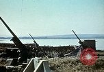 Image of Allied French soldiers man guns Tunis Tunisia Tunis Port, 1943, second 55 stock footage video 65675020446