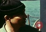 Immagine di Diversi Landing Craft Infantry preparando per sbarco in Normandia Inghilterra, 1944, secondo 59 filmato di repertorio 65675020454