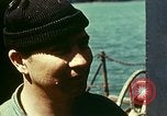Immagine di Diversi Landing Craft Infantry preparando per sbarco in Normandia Inghilterra, 1944, secondo 62 filmato di repertorio 65675020454