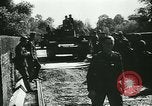 Standbild Deutsche Truppen marschieren in Merville Frankreich Merville Frankreich, 1940, aus Sekunde 14 historischem Filmmaterial Videoclip 65675020644