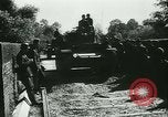 Standbild Deutsche Truppen marschieren in Merville Frankreich Merville Frankreich, 1940, aus Sekunde 16 historischem Filmmaterial Videoclip 65675020644