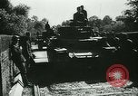 Standbild Deutsche Truppen marschieren in Merville Frankreich Merville Frankreich, 1940, aus Sekunde 18 historischem Filmmaterial Videoclip 65675020644
