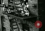 Image of Residents outdoors in their neighborhood Bronx New York City USA, 1965, second 23 stock footage video 65675020823