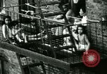 Image of Residents outdoors in their neighborhood Bronx New York City USA, 1965, second 26 stock footage video 65675020823