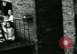Image of Residents outdoors in their neighborhood Bronx New York City USA, 1965, second 29 stock footage video 65675020823