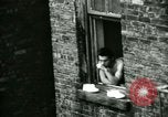 Image of Residents outdoors in their neighborhood Bronx New York City USA, 1965, second 31 stock footage video 65675020823
