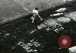 Image of Residents outdoors in their neighborhood Bronx New York City USA, 1965, second 50 stock footage video 65675020823