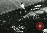 Image of Residents outdoors in their neighborhood Bronx New York City USA, 1965, second 51 stock footage video 65675020823