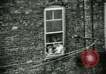Image of Residents outdoors in their neighborhood Bronx New York City USA, 1965, second 53 stock footage video 65675020823
