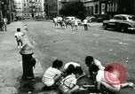 Image of Residents outdoors in their neighborhood Bronx New York City USA, 1965, second 58 stock footage video 65675020823