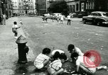 Image of Residents outdoors in their neighborhood Bronx New York City USA, 1965, second 59 stock footage video 65675020823