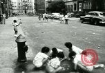 Image of Residents outdoors in their neighborhood Bronx New York City USA, 1965, second 60 stock footage video 65675020823