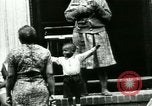 Image of Residents outdoors in their neighborhood Bronx New York City USA, 1965, second 61 stock footage video 65675020823