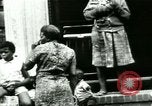 Image of Residents outdoors in their neighborhood Bronx New York City USA, 1965, second 62 stock footage video 65675020823