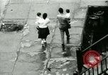 Image of Puerto Rican immigrants go to church and play baseball Bronx New York City USA, 1965, second 35 stock footage video 65675020826