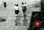 Image of Puerto Rican immigrants go to church and play baseball Bronx New York City USA, 1965, second 37 stock footage video 65675020826