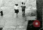 Image of Puerto Rican immigrants go to church and play baseball Bronx New York City USA, 1965, second 39 stock footage video 65675020826