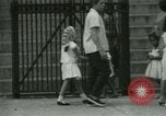 Image of Puerto Rican immigrants go to church and play baseball Bronx New York City USA, 1965, second 43 stock footage video 65675020826