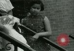 Image of Puerto Rican immigrants go to church and play baseball Bronx New York City USA, 1965, second 52 stock footage video 65675020826