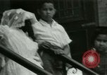 Image of Puerto Rican immigrants go to church and play baseball Bronx New York City USA, 1965, second 53 stock footage video 65675020826
