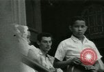 Image of Puerto Rican immigrants go to church and play baseball Bronx New York City USA, 1965, second 54 stock footage video 65675020826