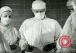 Image of operating room surgery New York United States USA, 1948, second 16 stock footage video 65675020858