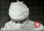 Image of operating room surgery New York United States USA, 1948, second 58 stock footage video 65675020858