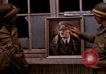 Image of Hitler portrait Cherbourg Normandy France, 1944, second 14 stock footage video 65675020905