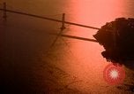 Image of Golden Gate bridge at sunset San Francisco California USA, 1967, second 3 stock footage video 65675020978