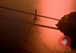 Image of Golden Gate bridge at sunset San Francisco California USA, 1967, second 9 stock footage video 65675020978